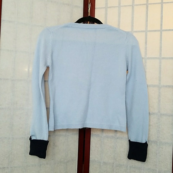 Light blue v-neck sweater. Size M. - Picture 2 of 2